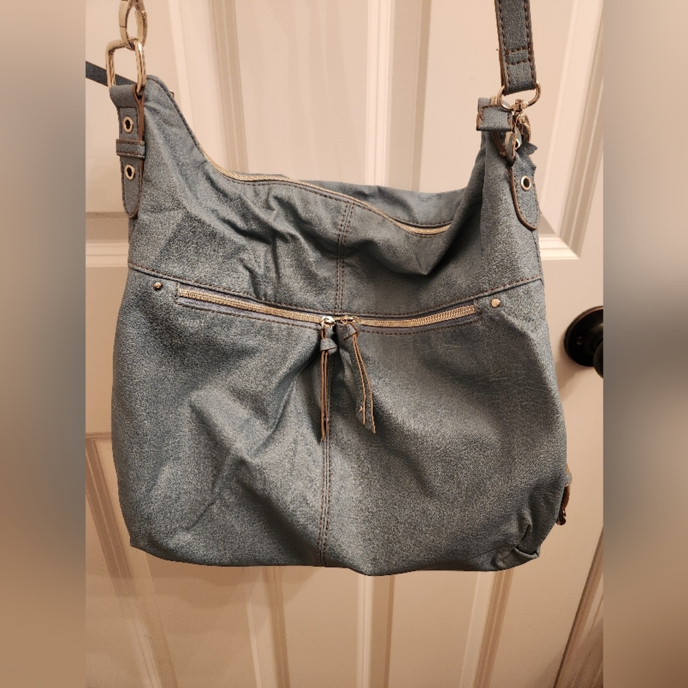 Relic light blue crossbody purse.